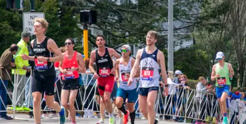 Heartbreak Hill running technique cadence uphill strategy